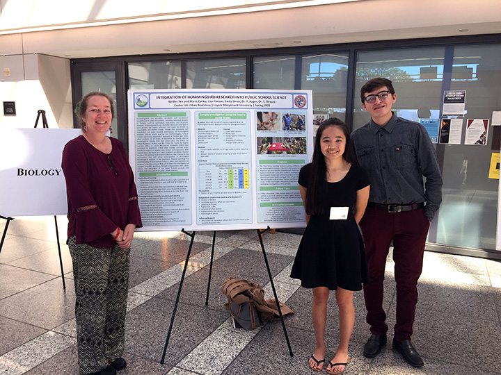 Maria Curley, a CURes Education Specialist, Kaitlyn Yee, LMU class of 2018, and David Ramirez, LMU class of 2021, present their work on hummingbird metabolism and activities in University Hall