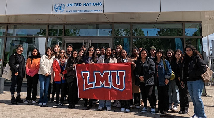 Heiskell Awardees standing outside of a United Nations location abroad