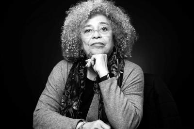 A black and white photo of scholar and activist Angela Davis