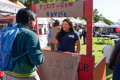 A student in a booth that says 