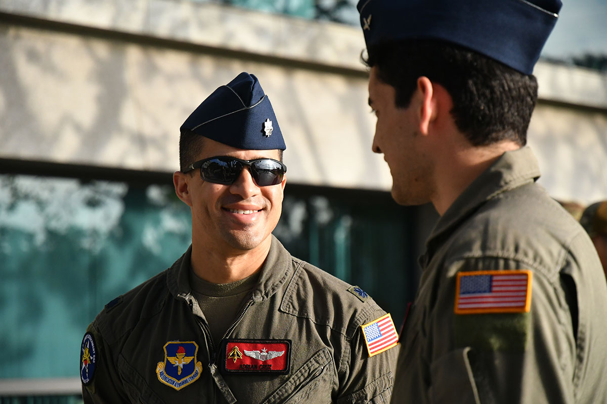 Two AFROTC officers talking whilst wearing US Air Force attire