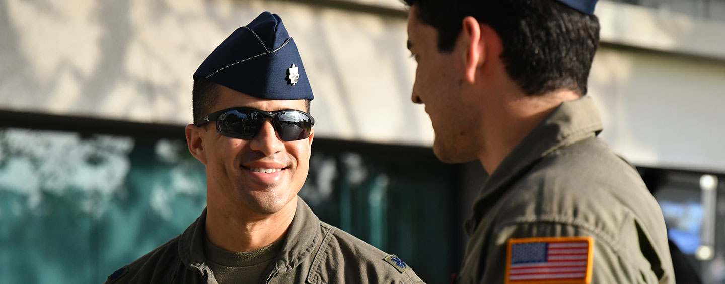 Two AFROTC officers talking whilst wearing US Air Force attire
