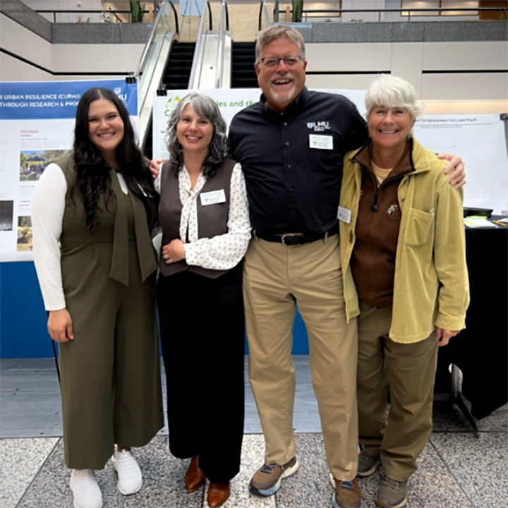 The CURes team at an event showcasing research posters in University Hall