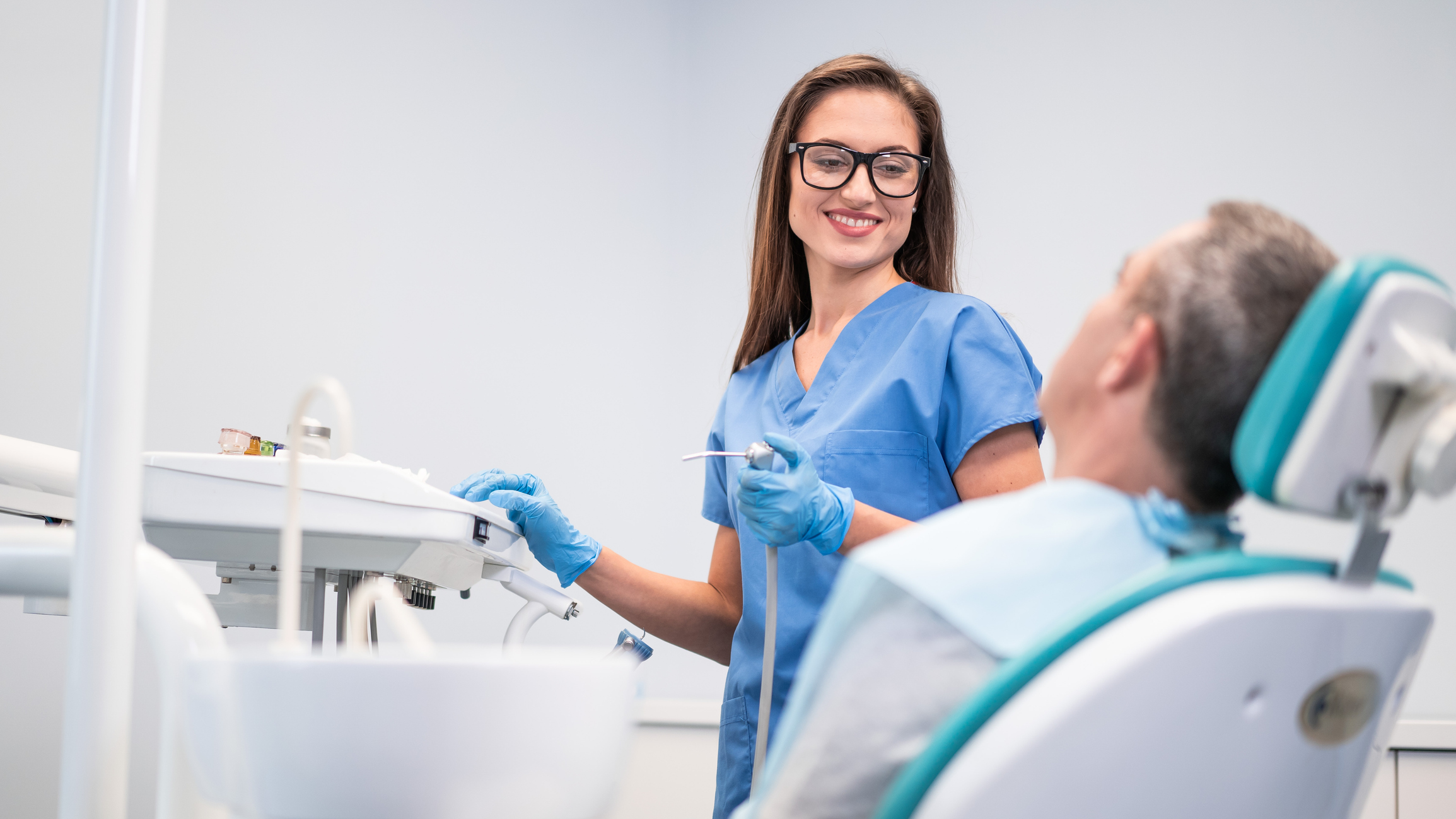 woman dental assistant smiling
