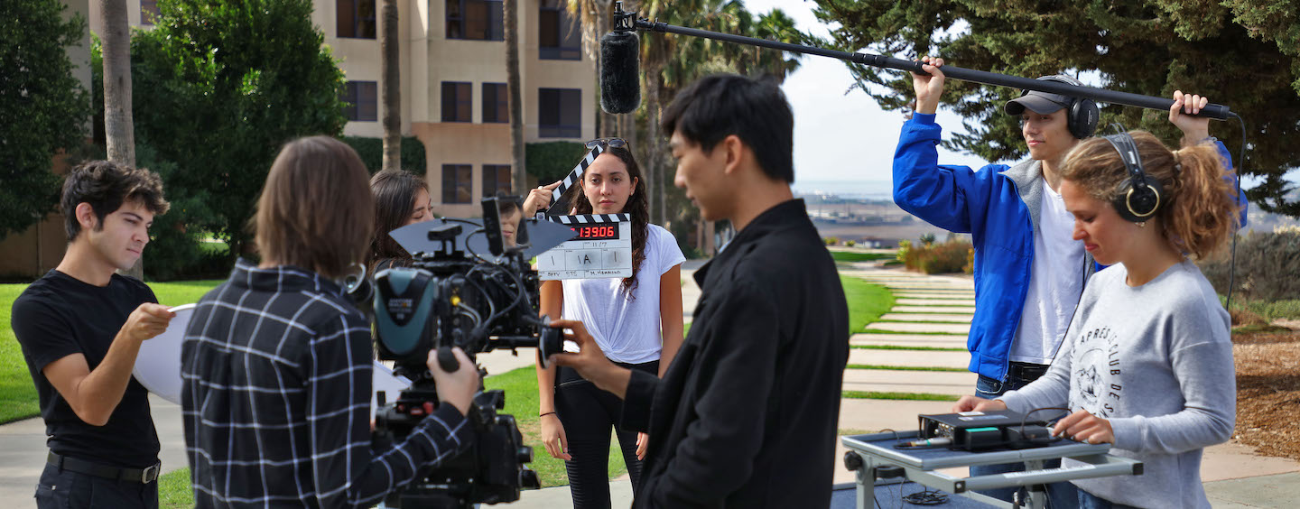 student film production crew filming on LMU campus