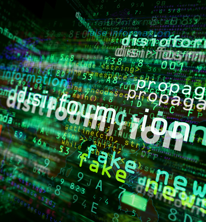 Words on a screen including disinformation and fake news