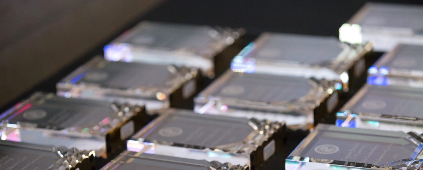 crystal award statues on a table