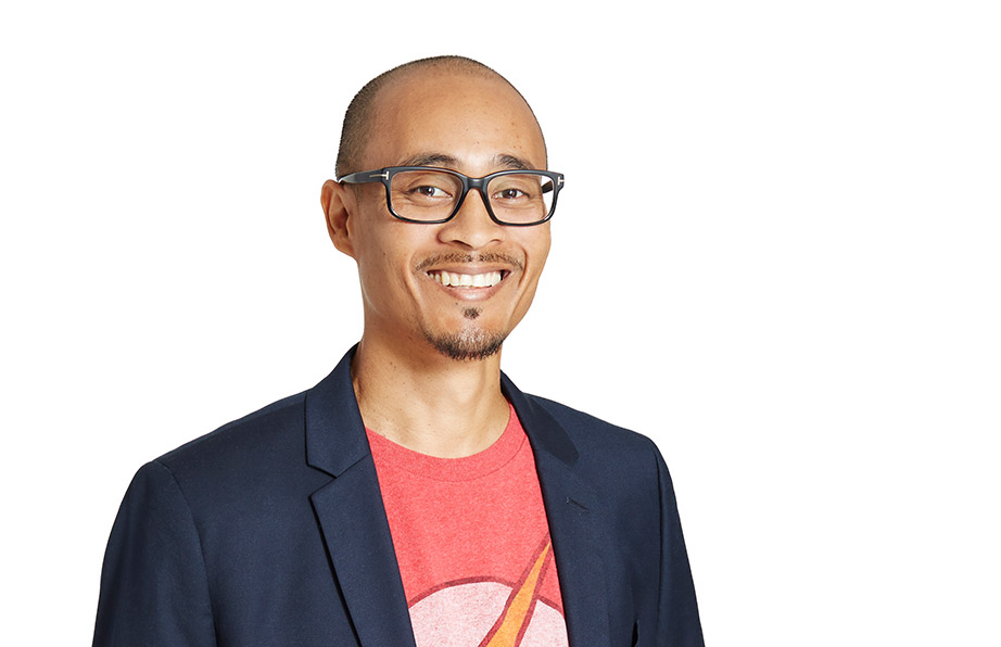 Mitchell Hamilton smiling with jacket and t-shirt